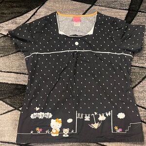 Hello Kitty Black Short Sleeve Scrub Tee with White, Black and Orange Accents